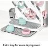 imageOXO Tot SpaceSaving Baby Bottle Drying Rack Compact Dish Drying Rack with Removable Trays Countertop Bottle Organizer for Baby Bottles Nipples Pacifiers and Lids BPA Free Dishwasher SafeExpandable